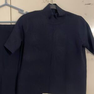 2 piece working outfit
Blouse & Skirt with slit
Color Navy Blue